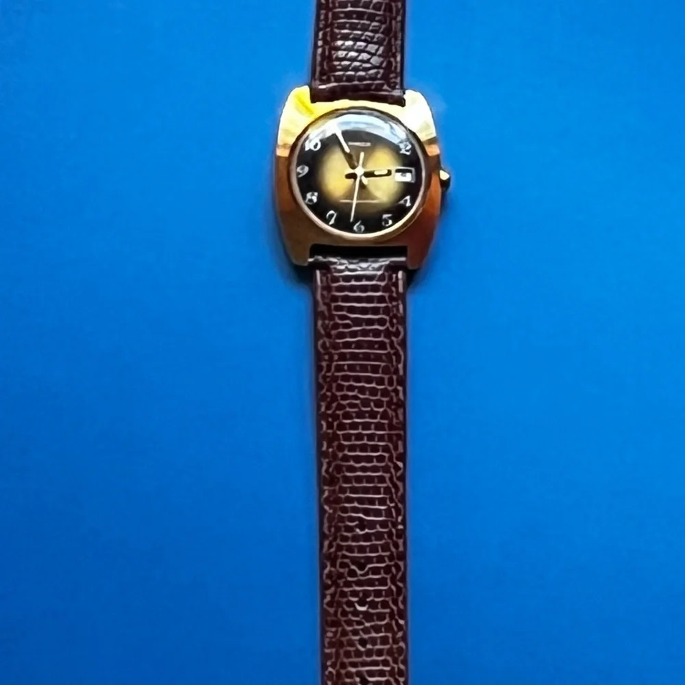 Timex Vintage Sprite Tigers Eye Face Date Manual Watch